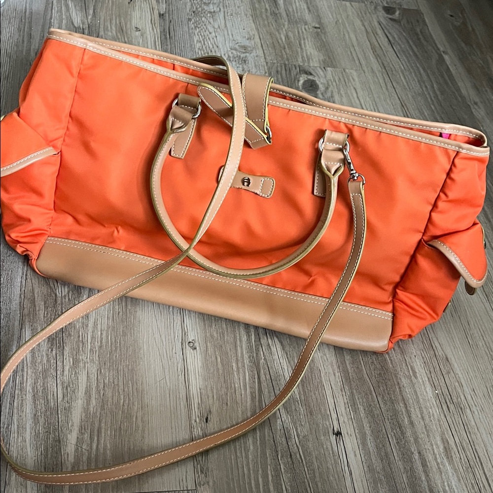 Etienne Aigner purse/ bag , very beautiful orange color, light and sexy